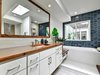Modern home with Bookcase, Shelves, Bench, Light Hardwood Floor, Recessed Lighting, Ceiling Lighting, Wood, Sliding Door Type, Metal, Interior, and Bath Room. Master Bathroom - solid wood counter top by Devos Custom Woodworking Photo 5 of POLO PROJECT