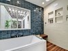 Modern home with Bench, Bookcase, Shelves, Ceiling Lighting, Recessed Lighting, Wood, Sliding Door Type, Metal, Interior, Ceramic Tile Floor, Freestanding Tub, Open Shower, Ceramic Tile Wall, and Bath Room. Master Bathroom - wet room Photo 6 of POLO PROJECT