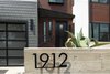 Modern home with Outdoor, Front Yard, Concrete Patio, Porch, Deck, Shrubs, Raised Planters, and Metal Patio, Porch, Deck. Detail Shot of cast-in-place concrete retaining wall Photo 8 of East 9th House
