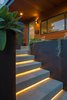 Modern home with House Building Type, Metal Roof Material, Wood Siding Material, Outdoor, Concrete Patio, Porch, Deck, Front Yard, Raised Planters, and Metal Patio, Porch, Deck. Entry Stair to Front Door Photo 2 of Norris House