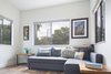 Modern home with Living Room, Ceiling Lighting, Medium Hardwood Floor, End Tables, and Sofa. Sitting Room Photo 8 of Norris House