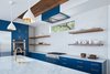Modern home with Kitchen, Refrigerator, Wine Cooler, Marble Counter, Range Hood, Wall Oven, Colorful Cabinet, Concrete Backsplashe, Dark Hardwood Floor, Stone Tile Backsplashe, Cooktops, Pendant Lighting, Ceramic Tile Backsplashe, Ceiling Lighting, and Undermount Sink. Kitchen Photo 3 of Chelsea House
