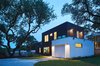 Modern home with Exterior, Wood Siding Material, Flat RoofLine, Small Home Building Type, and Stucco Siding Material. ADU Exterior Corner Dusk Photo 14 of Chelsea ADU