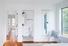 Modern home with Bedroom, Medium Hardwood Floor, and Cement Tile Floor. Bedroom to Bathroom Photo 5 of Chelsea ADU