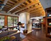 The Great Room sits below a lattice of Douglas Fir beams. Mahogany floors and casework evoke the traditional materials of Pacific Rim architecture. Photo 4 of Lakeside House modern home