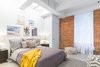 Guest bedroom with beach sunset tones Photo 5 of Chelsea Loft modern home