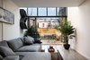 Folding glass doors open completely to deck and fenced back yard Photo 2 of Brooklyn Railroad Townhouse to Open Plan Renovation modern home