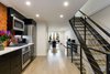 Turning the traditional railroad hallway into more space and an open stairway Photo 3 of Brooklyn Railroad Townhouse to Open Plan Renovation modern home