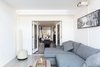 French doors create an open flow from the dining room to the living room and atrium Photo 6 of Brooklyn Railroad Townhouse to Open Plan Renovation modern home