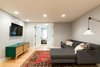 Entertainment lounge with frosted french doors to separate foyer Photo of Jersey City Basement to Entertainment Renovation modern home