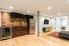 Wine fridge, wet bar, kitchen storage, and a full size fridge for entertaining Photo 2 of Jersey City Basement to Entertainment Renovation modern home