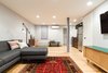 Open floor plan means refilling a glass doesn't take hosts out of the action Photo 3 of Jersey City Basement to Entertainment Renovation modern home