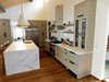 Modern home with Kitchen, Dark Hardwood Floor, Pendant Lighting, Refrigerator, Recessed Lighting, Wood Cabinet, Quartzite Counter, Undermount Sink, Subway Tile Backsplashe, Range, Range Hood, and Colorful Cabinet. New kitchen with Statuario marble counters, open hanging white oak shelves from LR Custom Fabrication, custom cabinets, and top of the line appliances under a tongue and groove pine ceiling. Photo 20 of The McCarthy Project
