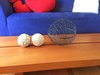 The blue couch in living room is a good contrast to the dark gray wall and the colorful ottomans. Photo 7 of The Bubbles House modern home