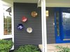 The colorful art glass highlights the front porch. Created by Wolf Art Glass Photo 19 of The Bubbles House modern home
