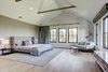 Modern home with Bedroom, Bed, Chair, Storage, Lamps, Night Stands, Ceiling Lighting, Dresser, Light Hardwood Floor, Rug Floor, and Recessed Lighting. Master bedroom. Photo 5 of Jagger Lane