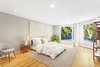Guest Bedroom with French Doors to Backyard Photo 6 of Prospect Place modern home