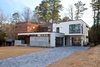 Atlanta Design Economy Credits
Architecture: Plexus r+d
General Contractor: Apex Homes, Milani Homes
Interior design and millwork: Amir Nejd. Photo of Nejad Residence modern home