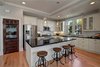 The door to the pantry adjacent to the kitchen was one of the original doors in the house that we were able to reuse and re-purpose. While the entire house has been updated, there are many nods to the original home. Photo 2 of Madrona Victorian modern home