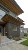 Originally a nondescript single story home, the owners hoped to add both a second story as well as a new modern sensibility to their home. Deep exaggerated eaves on the east and west sides provide visual interest as well as shading during the summer months. Photo 2 of Eave House modern home