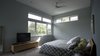 The master bedroom takes advantage of the extra high ceilings in order to create a quiet retreat space. Photo 8 of Eave House modern home
