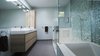 The modern layout creates a fun place to get ready each day. Photo 10 of Eave House modern home