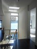 This third story master suite is completely open from stair to master bedroom and master bath. Photo 3 of Lake Washington Home modern home