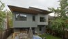 A new deck and connection to the exterior was created in order to take advantage of the new open plan. Photo 12 of Eave House modern home