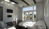 The master bedroom embraces the sophistication that comes with simplicity. The wide windows and glass doors let light stream into the room and create a connection to the rest of the beautiful Kirkland neighborhood and the view beyond. Photo 8 of Mod Remodel modern home