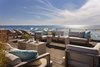 Sweeping views on the spacious roof deck create the perfect place to relax or entertain. Photo 3 of The Cape modern home