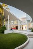 Modern home with Outdoor, Back Yard, Grass, Hardscapes, and Walkways. A view of the connection between outdoor and indoor from exterior patio (Eichler principle). Photo 4 of Contemporary Eichler Offspring