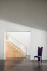 Modern home with Staircase, Glass Railing, and Wood Tread. Staircase, view from the living room Photo 3 of Upgraded A-game