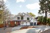 Modern home with Exterior, Wood Siding Material, A-Frame RoofLine, House Building Type, and Stucco Siding Material. Front facade Photo 11 of Upgraded A-game