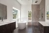 Master suite bathroom Photo 12 of Skyline to the Sea House modern home