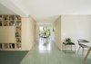 Modern home with Cement Tile Floor, Carpet Floor, Shelves, Storage, Chair, and Dining Room. open plan living room Photo 11 of Haus Mai