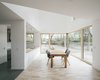 Modern home with Medium Hardwood Floor. dining area Photo 11 of Haus P