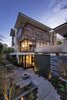 The stone walkway that's going to the basement Photo 18 of The Floating House modern home