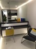 The desk and folded away bed, with full wall mirror above for that illusion of size! Photo 2 of The Tiny house modern home