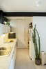 A door hides the boiler and the pantry Photo 2 of Artigas modern home