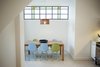 The window with colored glass is original from the house and has been restored to be relocated. Photo 6 of Artigas modern home