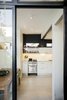 The kitchen seen from the patio. Photo 7 of Artigas modern home