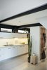 The original beams and the wall above the cupboard have been painted in black Photo 4 of Artigas modern home
