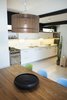 The table and the lamp above are both made in rustic wood, combined with eam's chair in different colors. Photo 5 of Artigas modern home