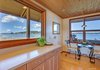 Corian Countertops and Breakfast Nook Photo 8 of Idyllic Lopez Island Bayfront Home modern home