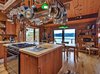 Kitchen with Butcher Block Counter Tops, Island & Pot Rack Photo 7 of Sea Oaks: Private Gated Compound on 4+ Acres modern home