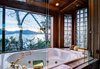 Custom Master Bath Features Jetted Tub & Large Sliding Window Photo 9 of Sea Oaks: Private Gated Compound on 4+ Acres modern home