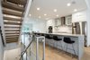 Kitchen and floating stairs. Photo 5 of LIV233 modern home