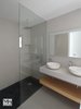 Modern home with Bath Room, Open Shower, Pedestal Sink, Concrete Floor, and Concrete Wall. Bathroom interior Photo 7 of Vivienda Bosom