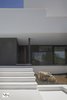 Modern home with Staircase and Concrete Tread. Partial facade detail Photo 9 of Vivienda Bosom