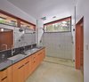 Modern home with Bath Room, Wall Lighting, Enclosed Shower, Concrete Floor, Engineered Quartz Counter, Undermount Sink, Ceiling Lighting, Full Shower, and Ceramic Tile Wall. Master Bathroom Photo 5 of Nelson Preserve Family Retreat